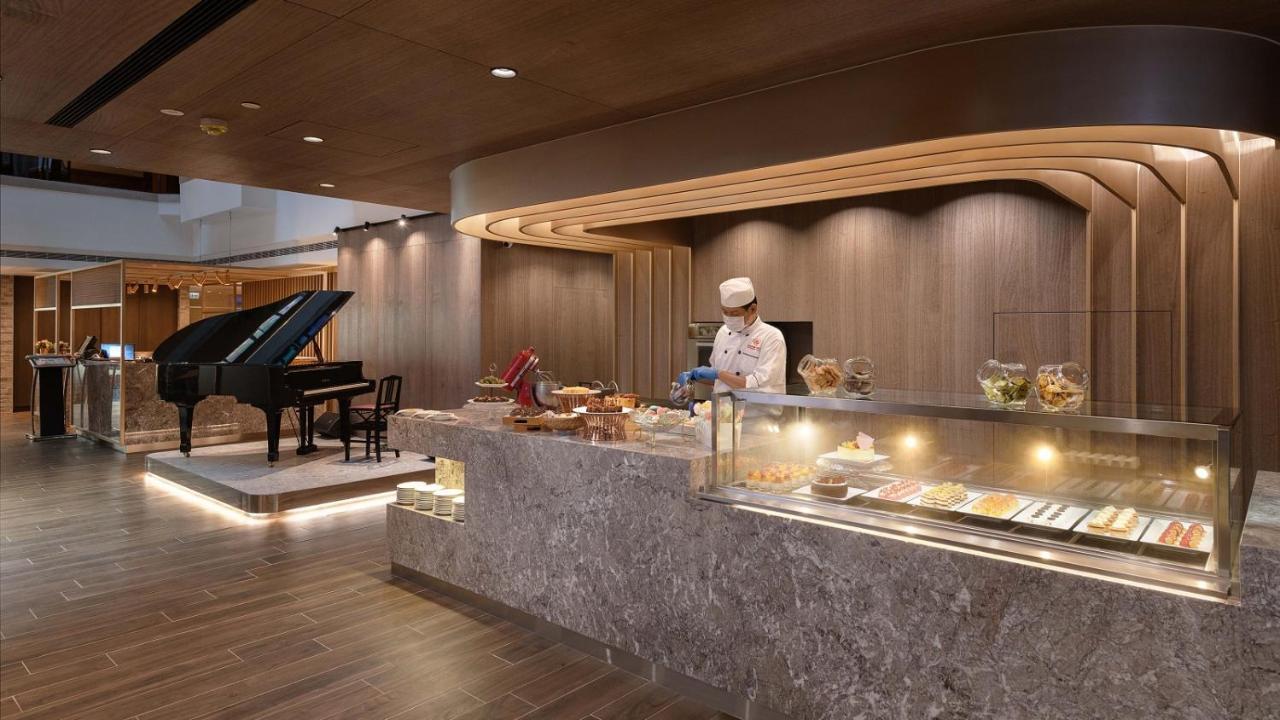 The Howard Plaza Hotel Kaohsiung Bagian luar foto The Wing at Hong Kong International Airport