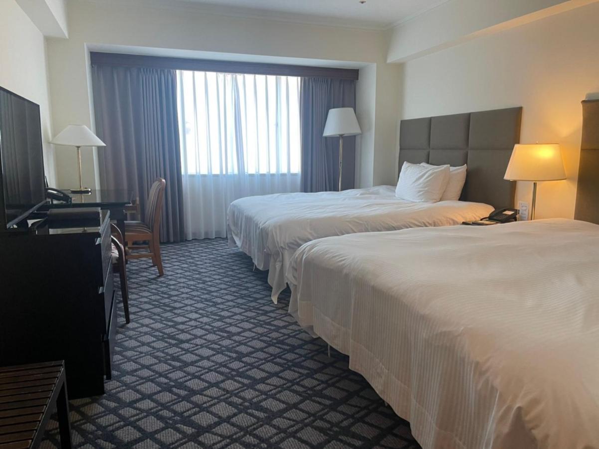 The Howard Plaza Hotel Kaohsiung Bagian luar foto A room at the hotel