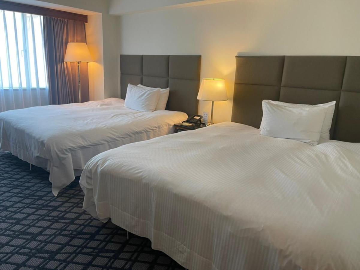 The Howard Plaza Hotel Kaohsiung Bagian luar foto A room at the hotel