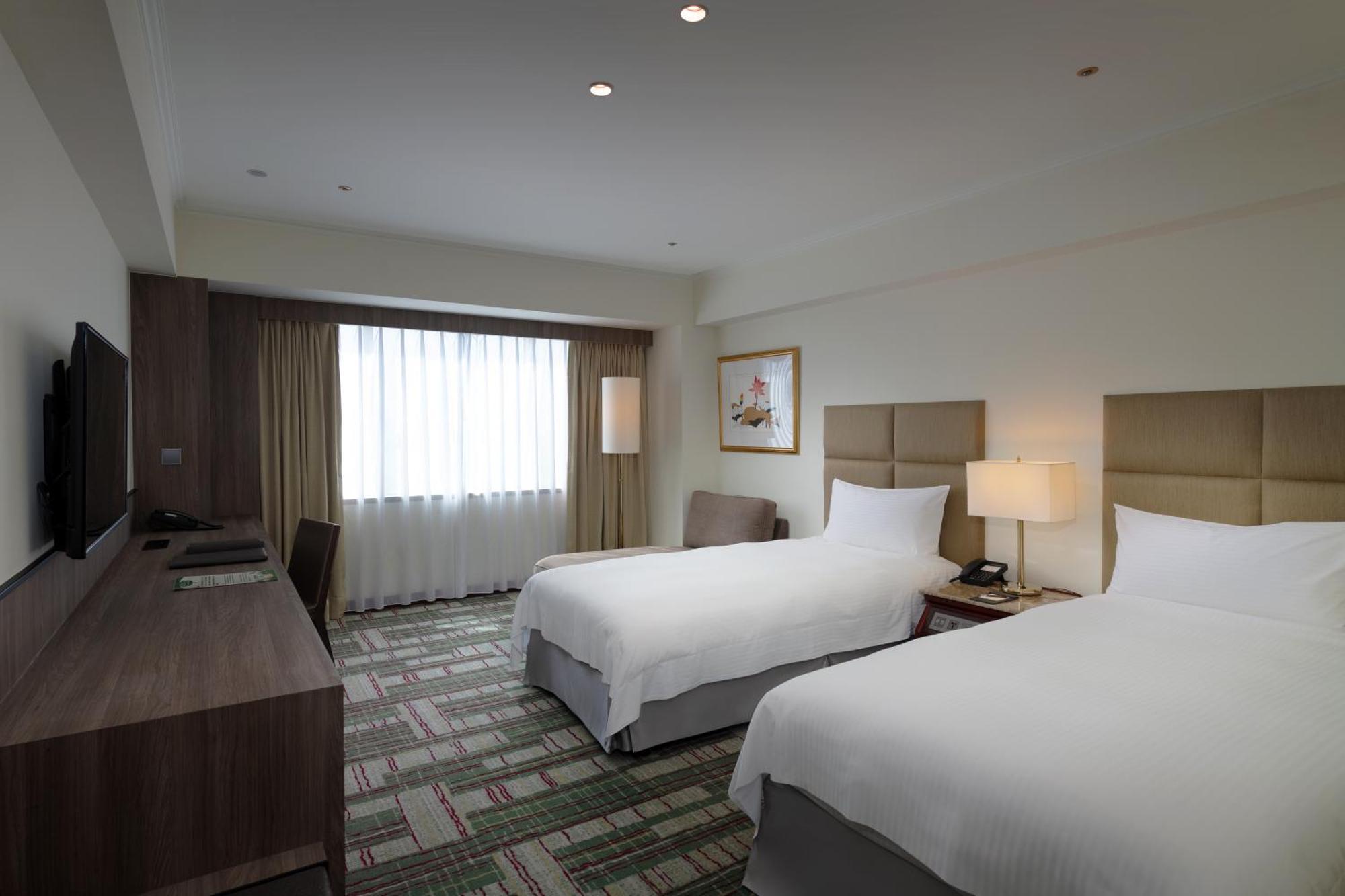 The Howard Plaza Hotel Kaohsiung Bagian luar foto Deluxe Room