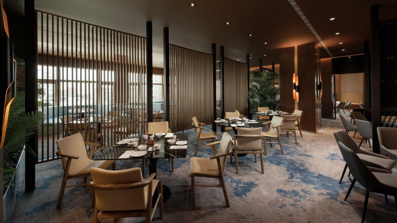 The Howard Plaza Hotel Kaohsiung Bagian luar foto The Wing at Hong Kong International Airport