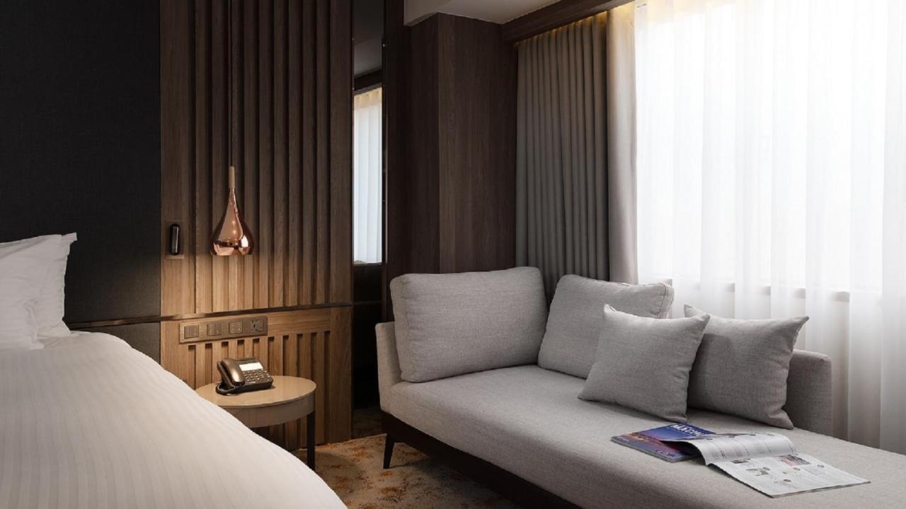 The Howard Plaza Hotel Kaohsiung Bagian luar foto A room at the hotel